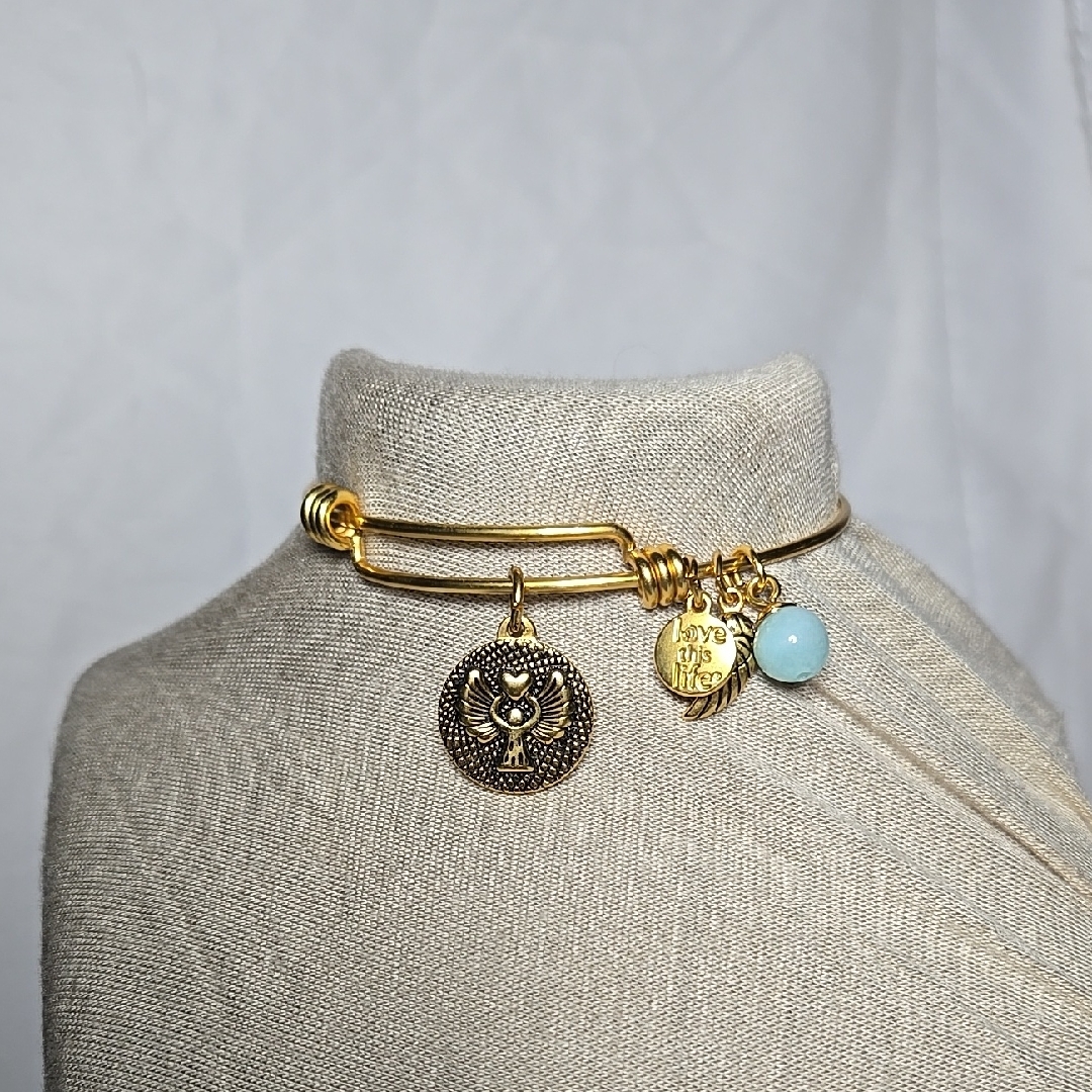 Gold Charm Bracelet With Angel Theme Pendants 34$